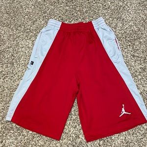 Red Jordan basketball shorts. Size small